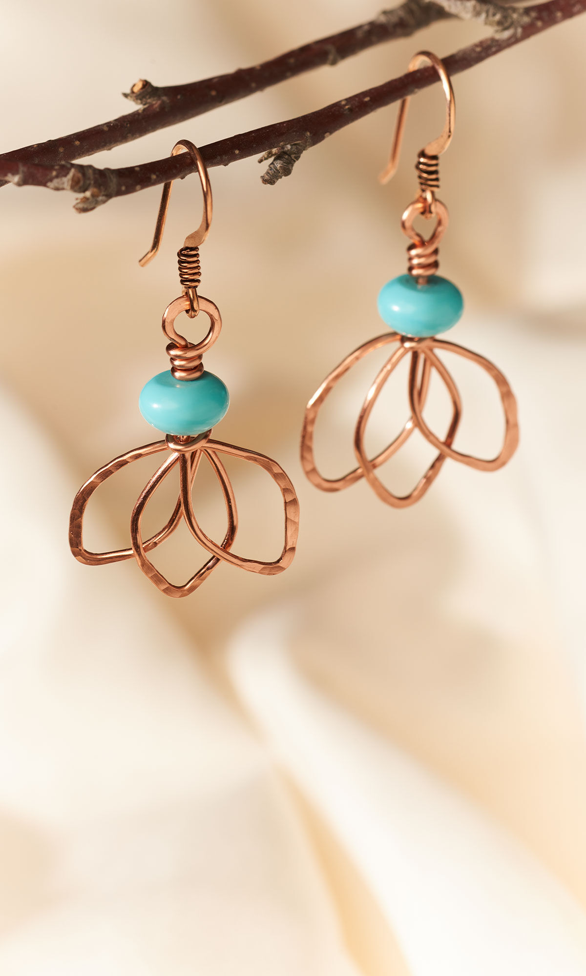 Design Idea RE2F Earrings on stylized background